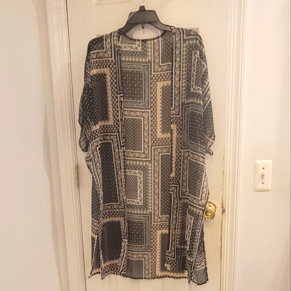 GeeGee NWOT Komino Medium